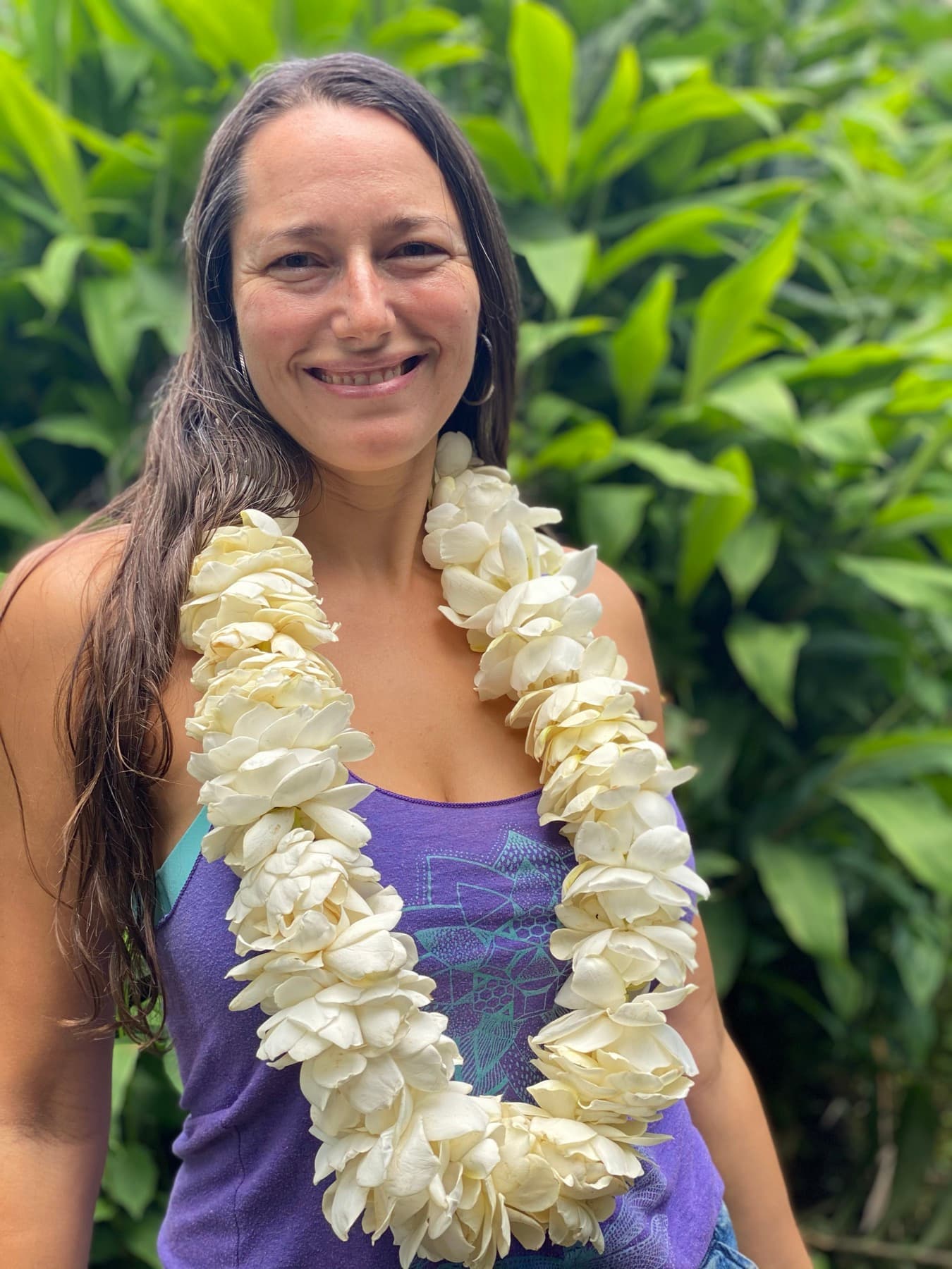 Portrait surrounded by tropical greenery