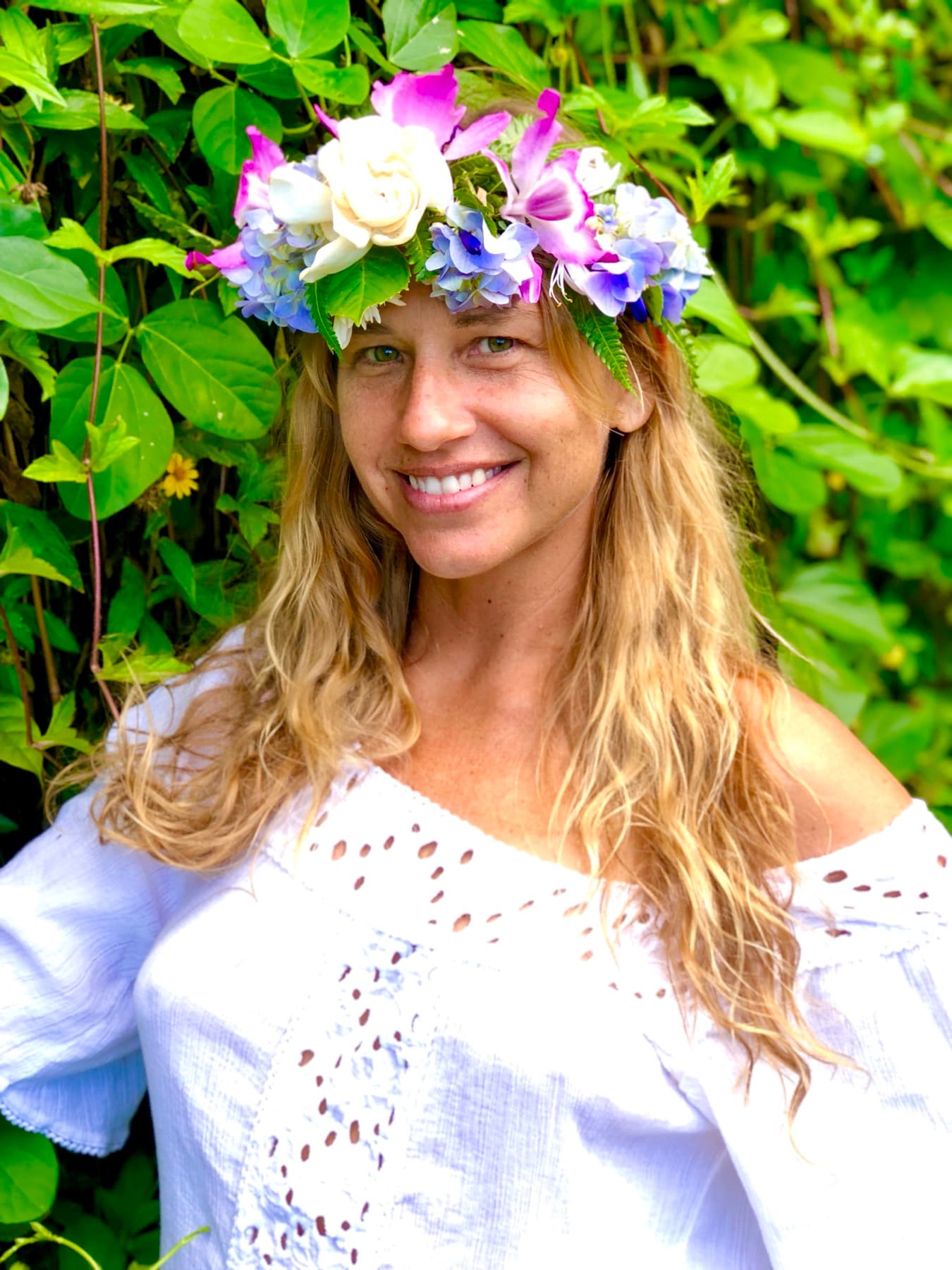 Portrait with floral crown in greenery