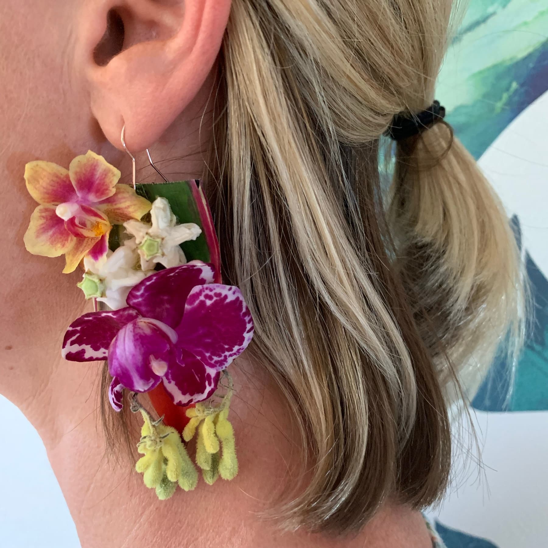 Handcrafted floral piece with orchids